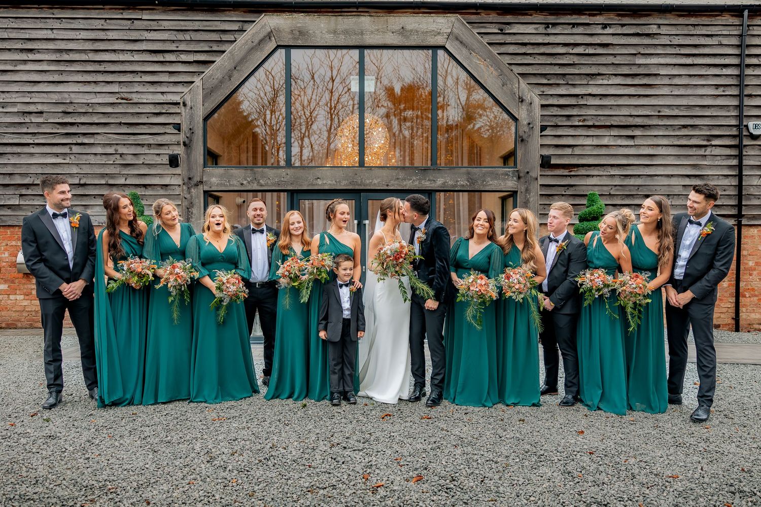 Documentary photography capturing group wedding photos.