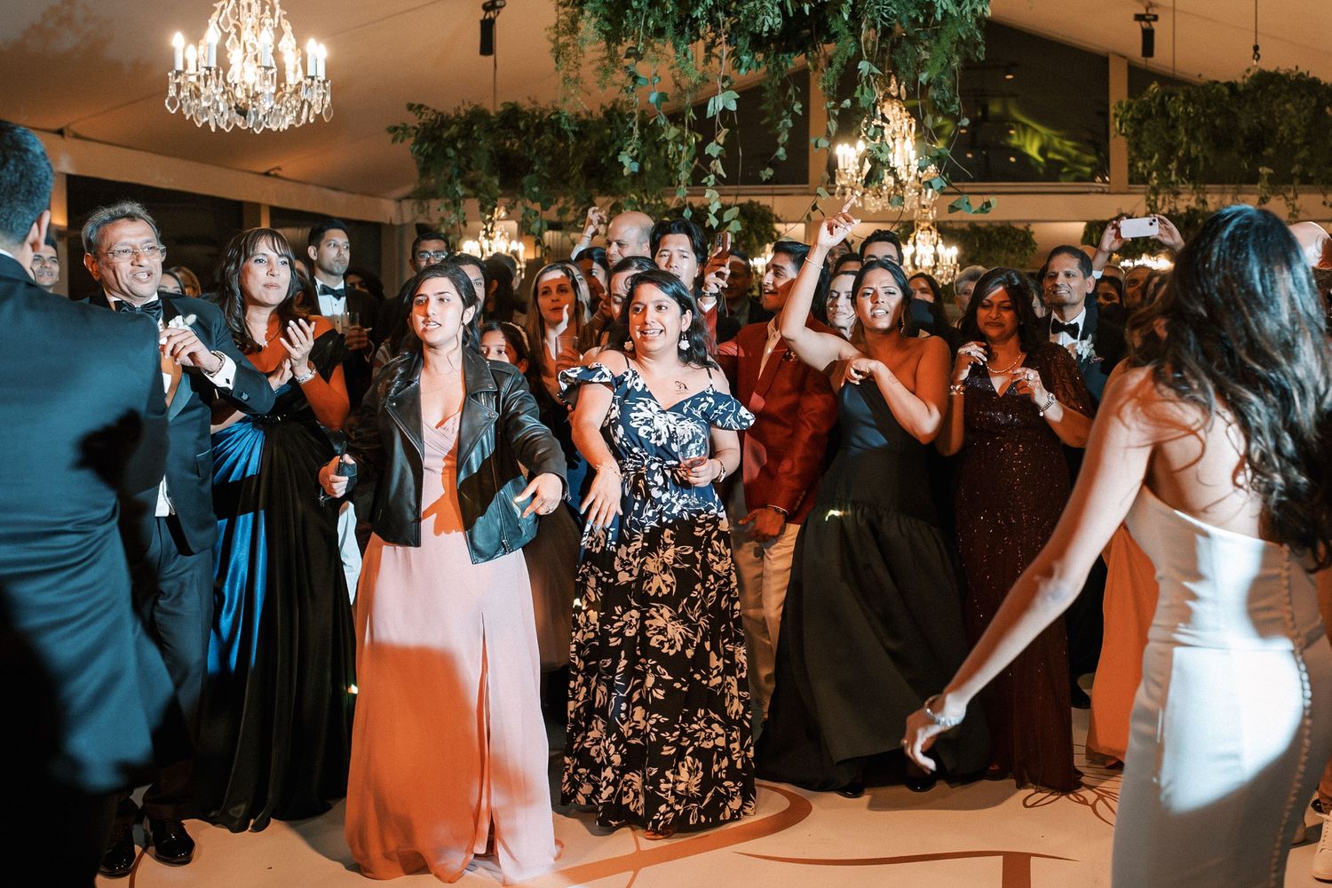 Guests surrounding the couple in an electric moment at Correio-Mor palace wedding in Lisbon