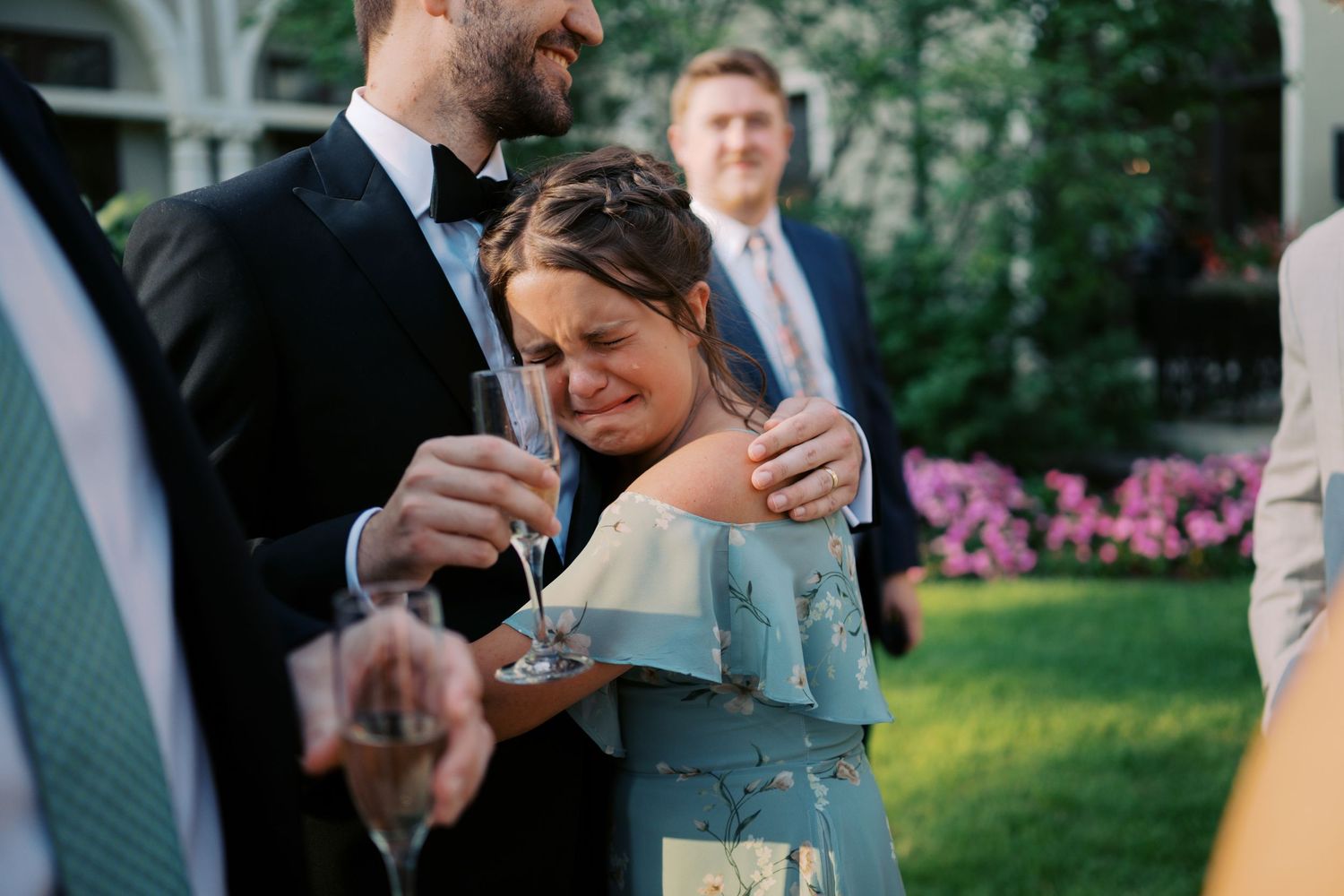 Happy couple shares a joyful moment together during an outdoor wedding ceremony.