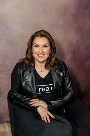 Professional portrait series showing a model in a black leather jacket against a mottled purple backdrop.