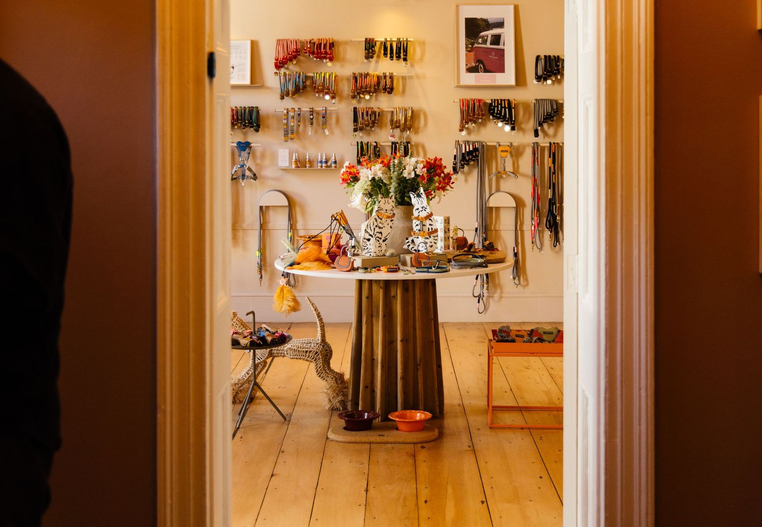 Warm hallway interior with wooden accents and soft lighting creates an inviting atmosphere.