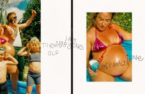 A group of friends enjoying a fun summer day outdoors with signs and laughter.