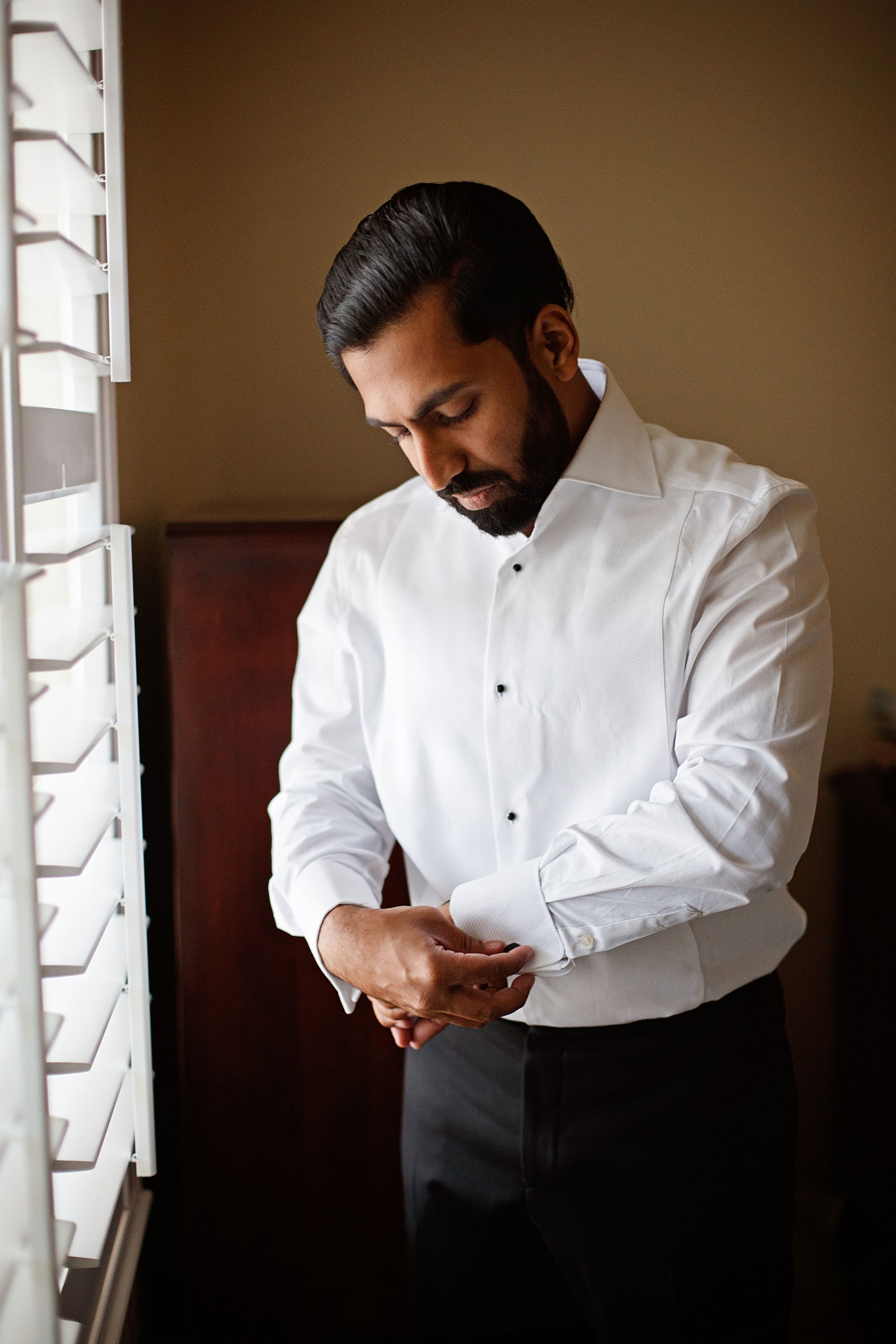 groom getting ready before ceremony