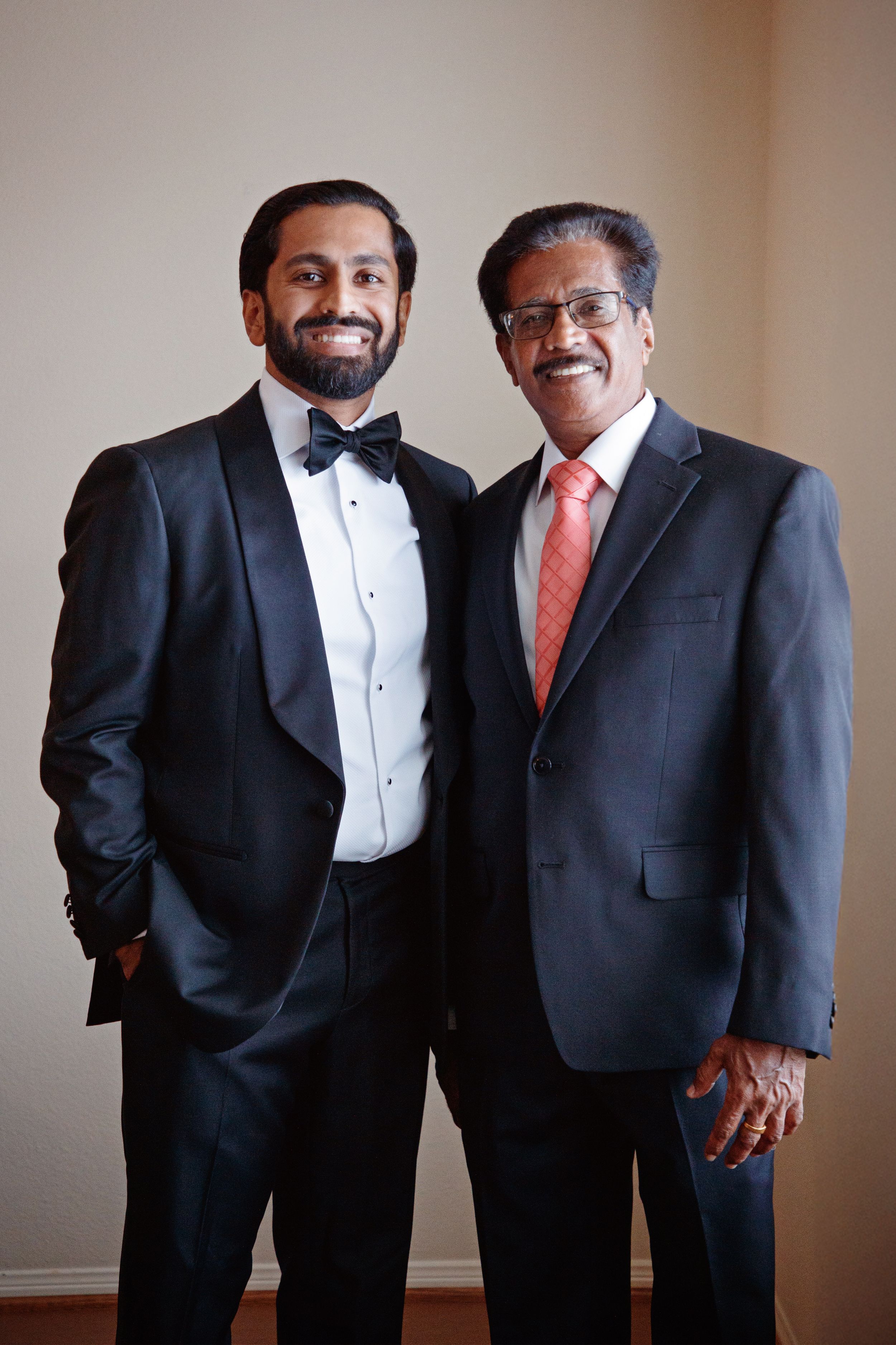 groom with father getting ready before ceremony