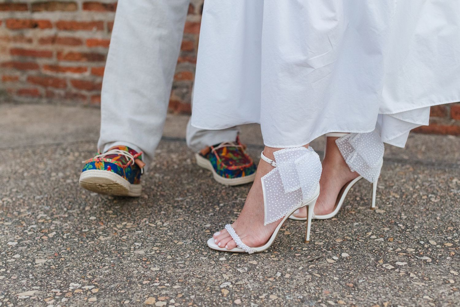 Wedding photo. Shoes of the bride and groom. Castillo San Cristóbal in Old San Juan, Puerto Rico.