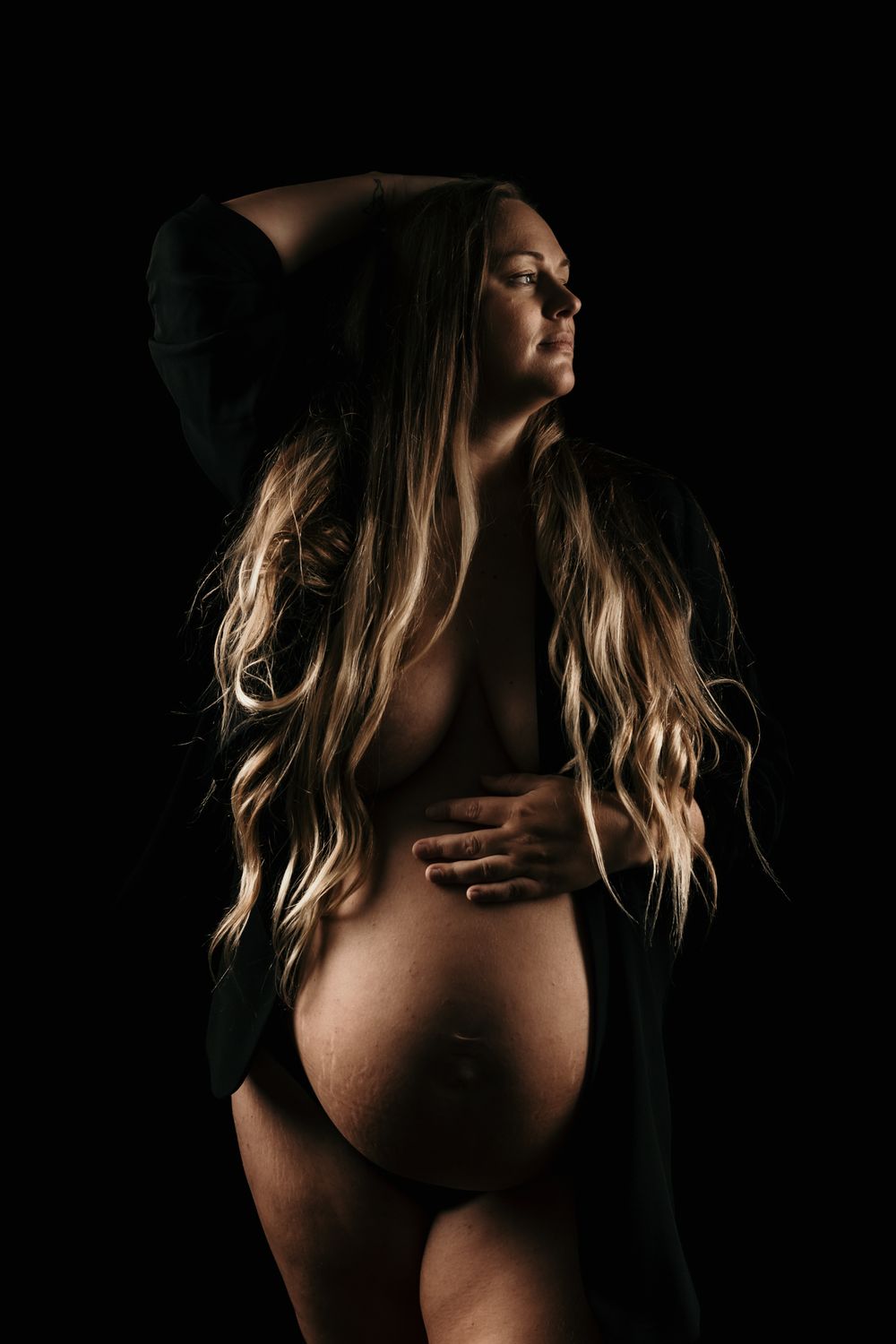 A dramatic silhouette series showing a figure with blonde hair against a dark background in various artistic poses.
