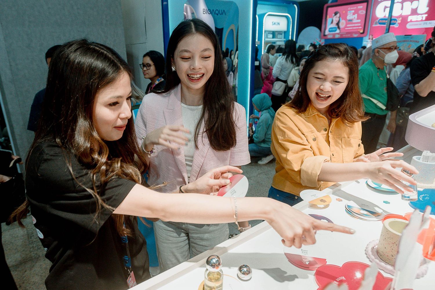 People gathered around a table participating in a creative workshop or craft activity together.
