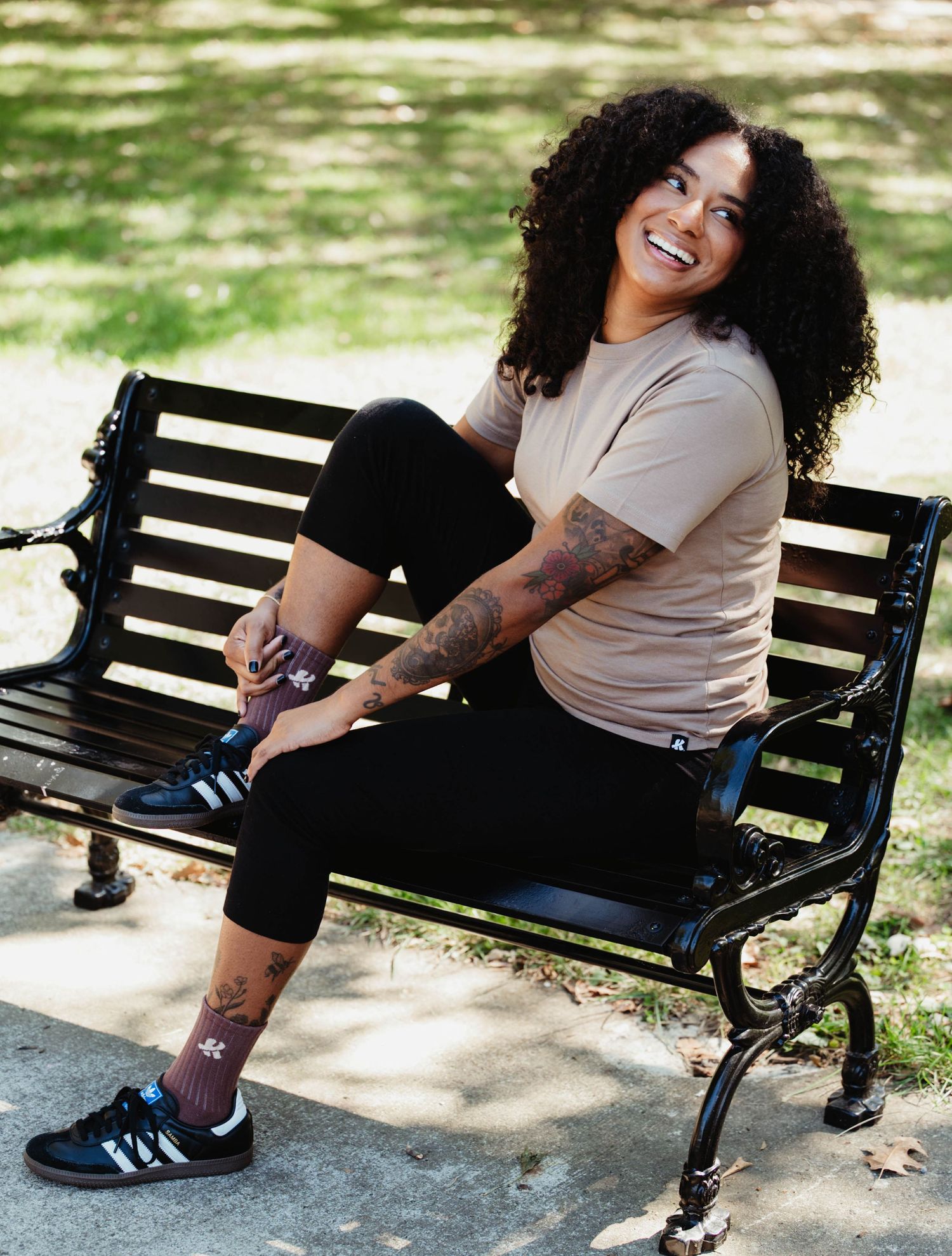 A series of casual outdoor portraits showing someone seated on a park bench in different relaxed poses.