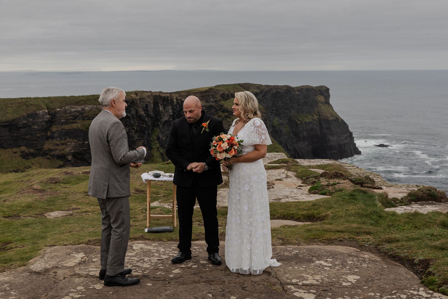 Emotional cliffside elopement ceremony in County Clare, Ireland.