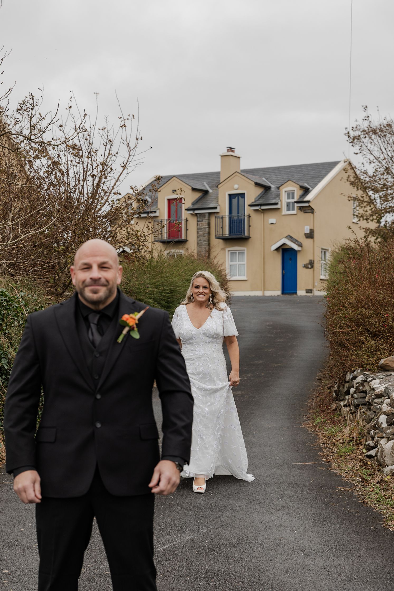 Bride walking toward groom for first look in Ireland.