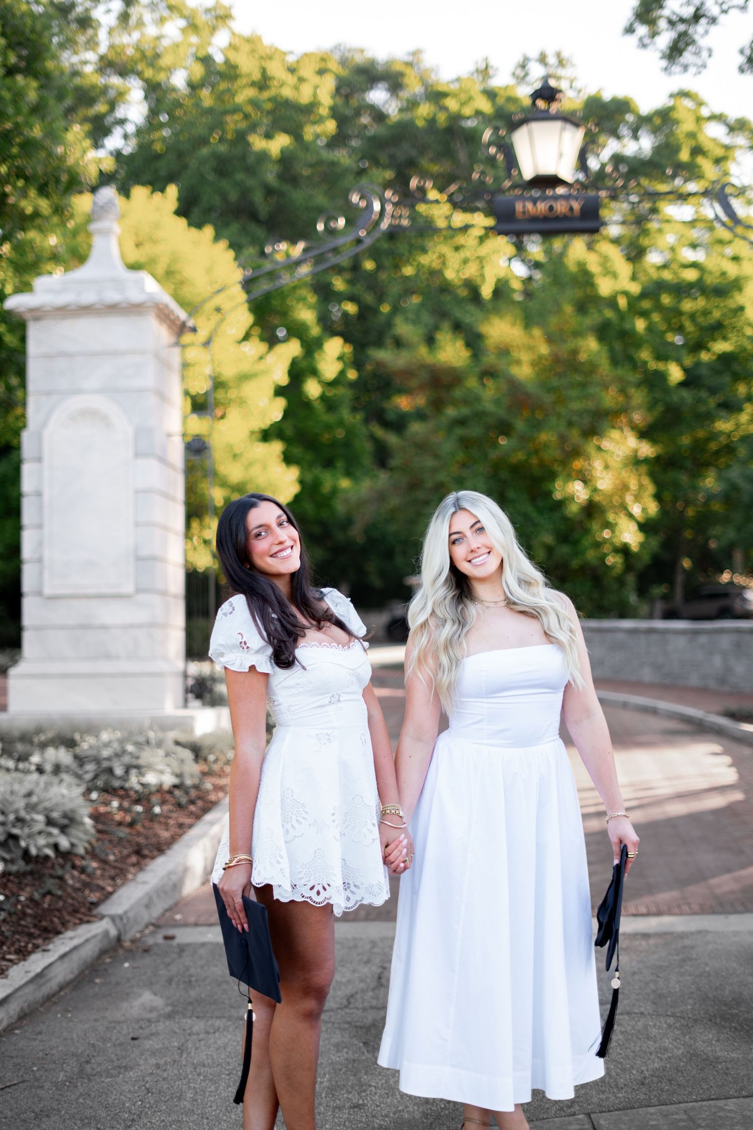 Emory graduation photos at Emory Archway Sign