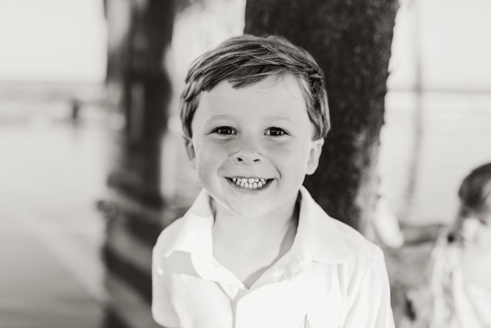 Child portrait in natural outdoor setting with black and white filter.