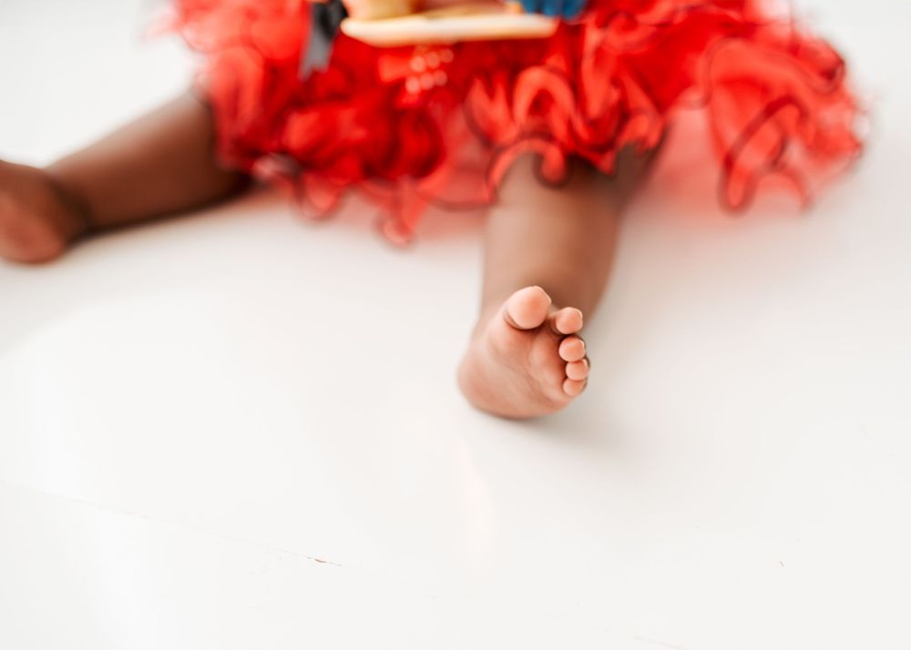 Abstract close-up shots featuring red tulle fabric details on white background.