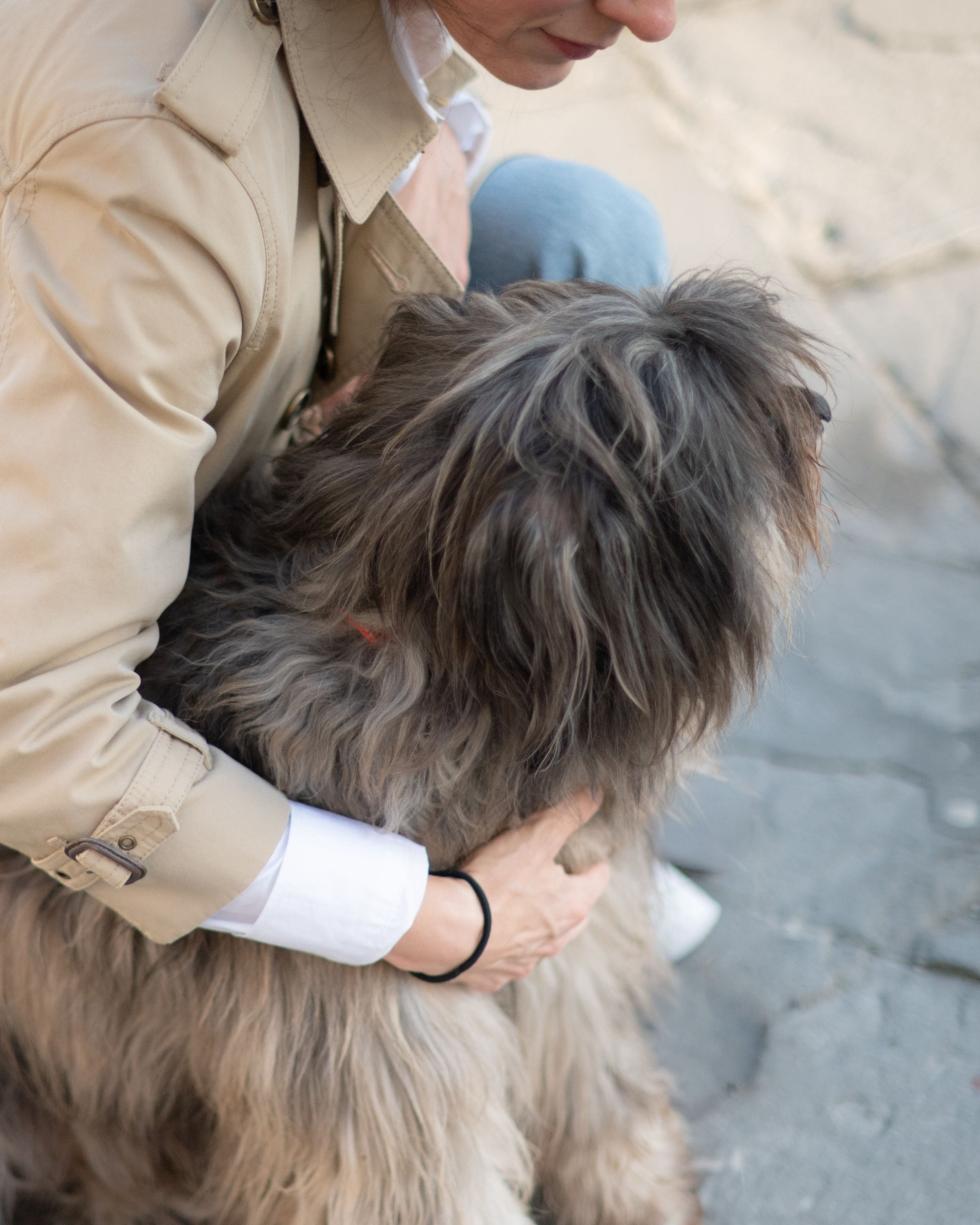 person with their dog during a natural portrait session