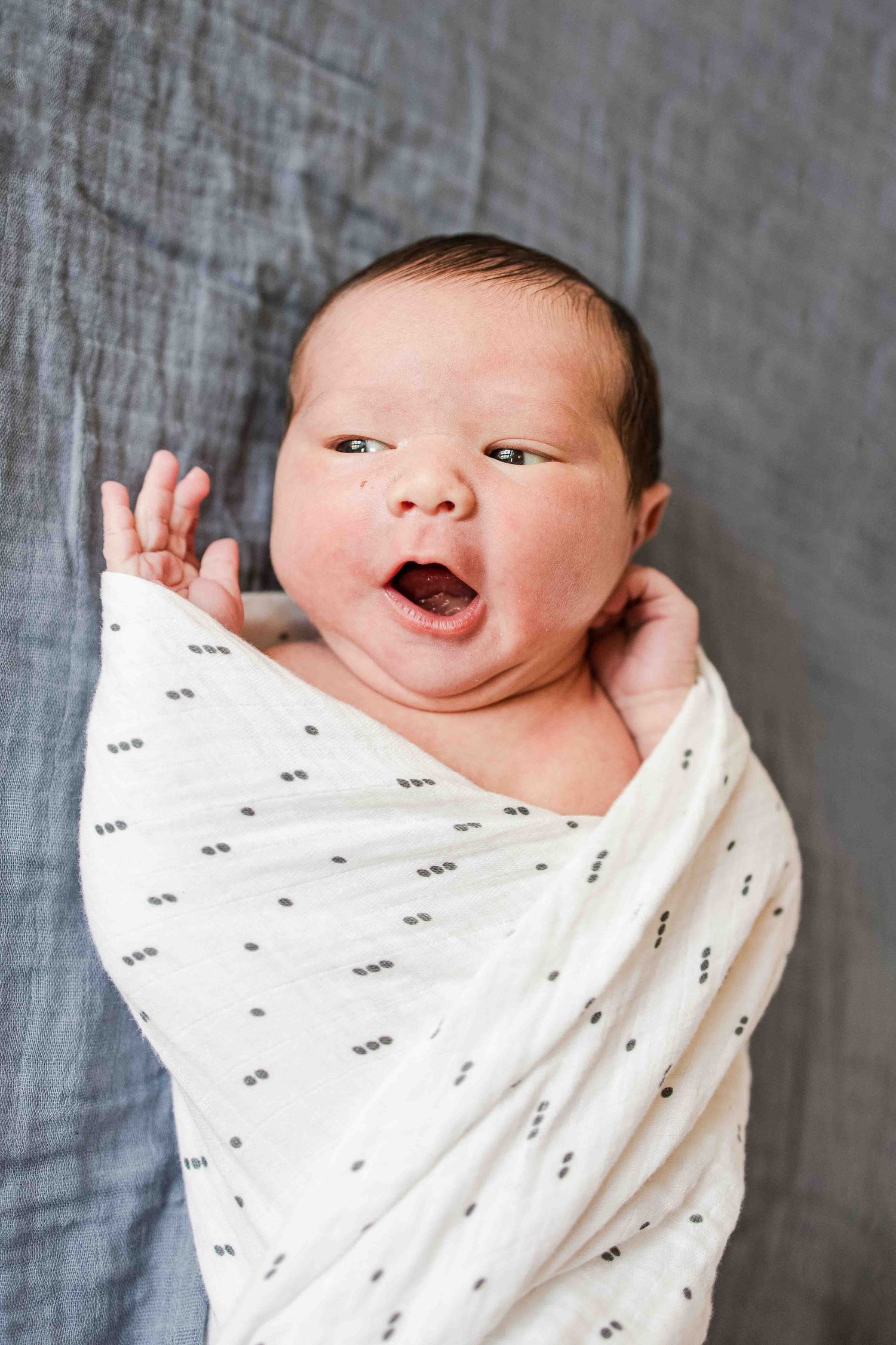 Precious moments captured during a newborn photography session in Raleigh, NC, with cozy blankets and sweet details.