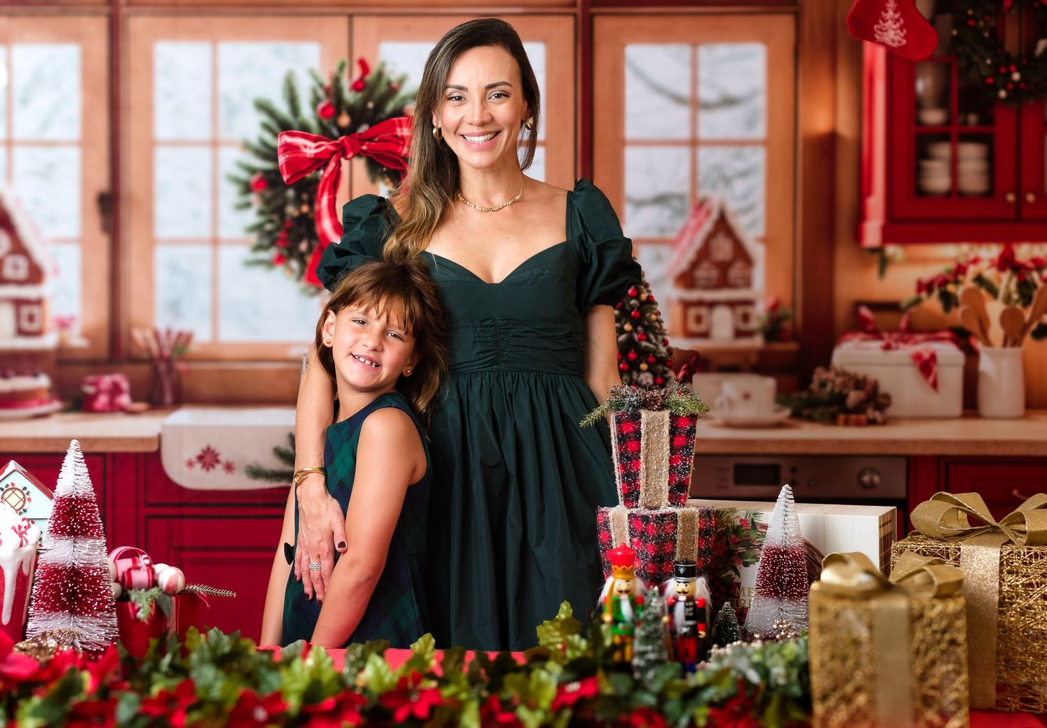 Festive holiday scene with elegant black dress amid Christmas decorations and wrapped presents.