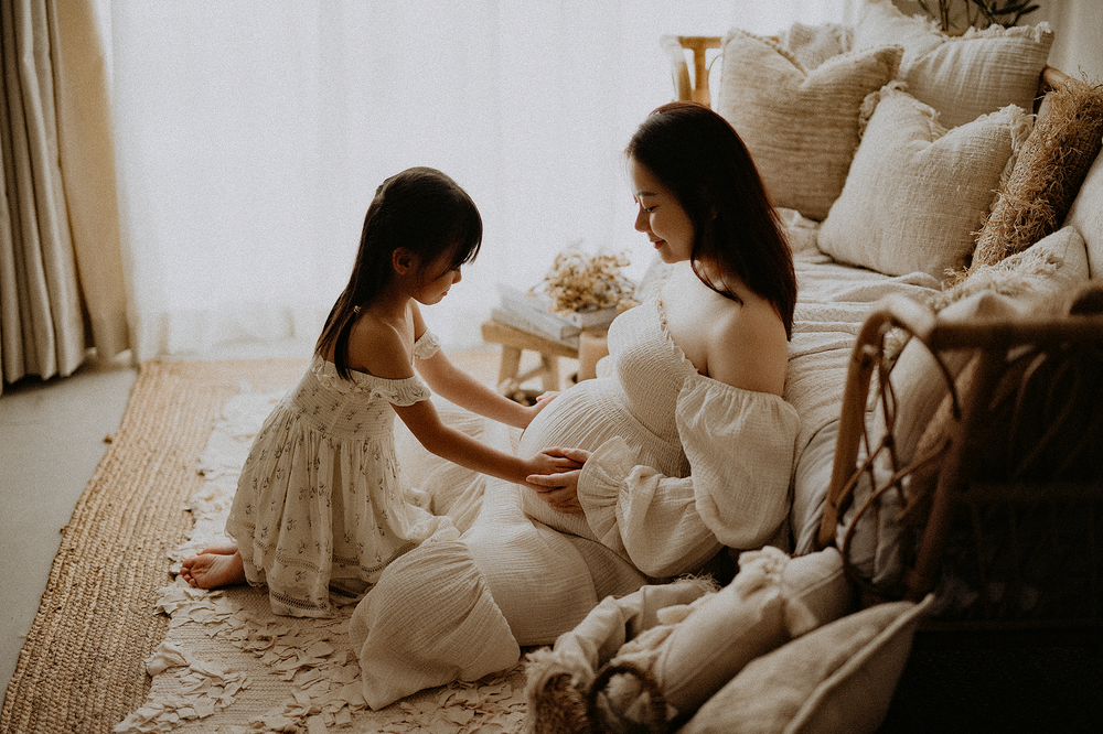 Singapore lifestyle and newborn baby and maternity photography capturing heartfelt, light-filled moments for families and new parents.
