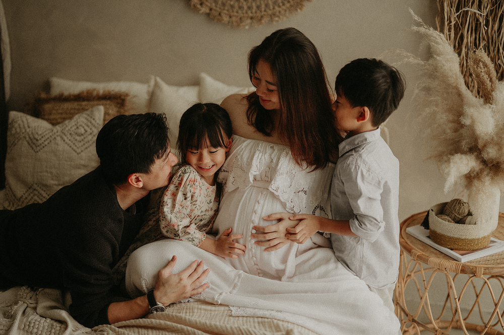 Singapore lifestyle and newborn baby and maternity photography capturing heartfelt, light-filled moments for families and new parents.