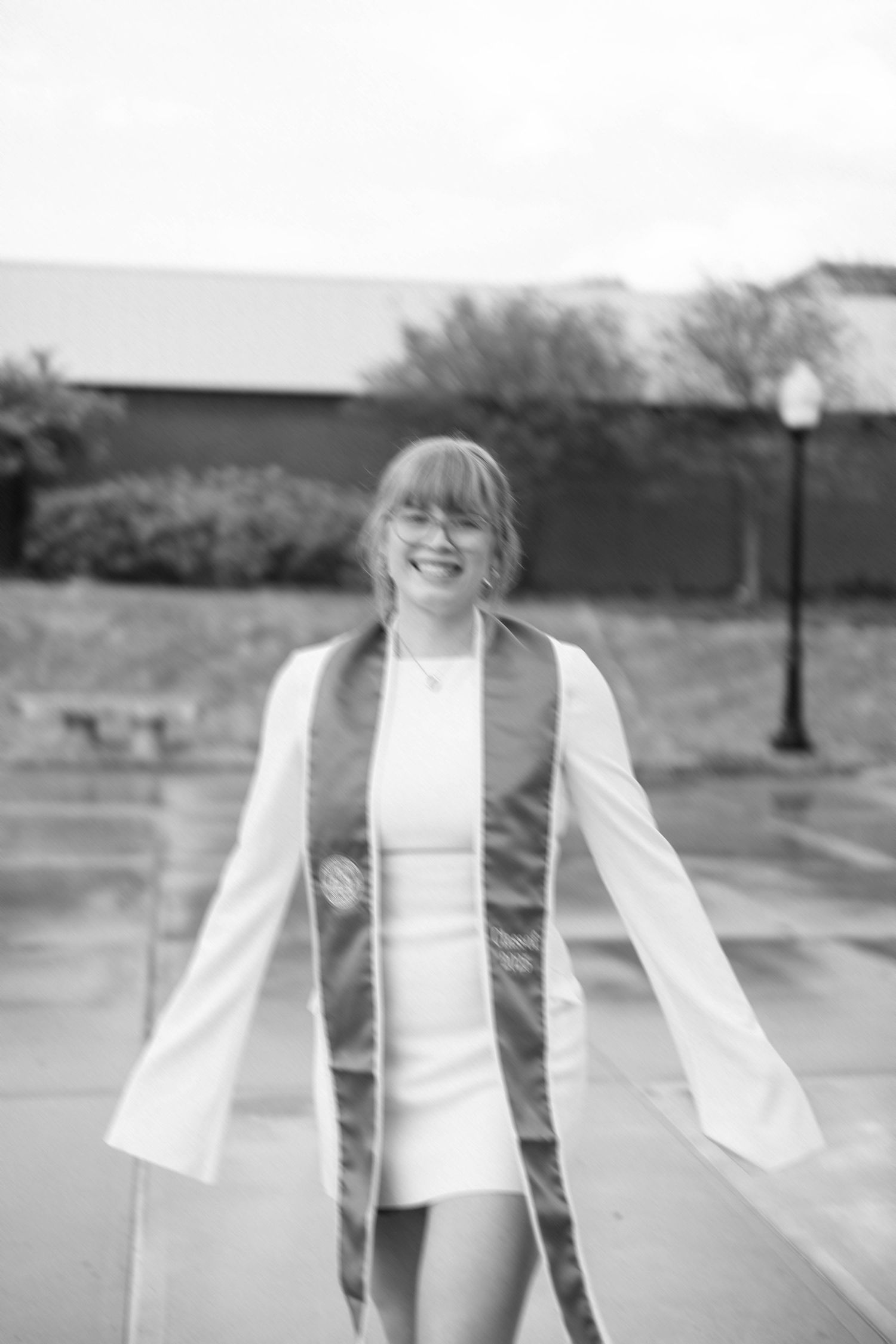 Spring outdoor college graduation photos at Illinois State University in Normal, Illinois