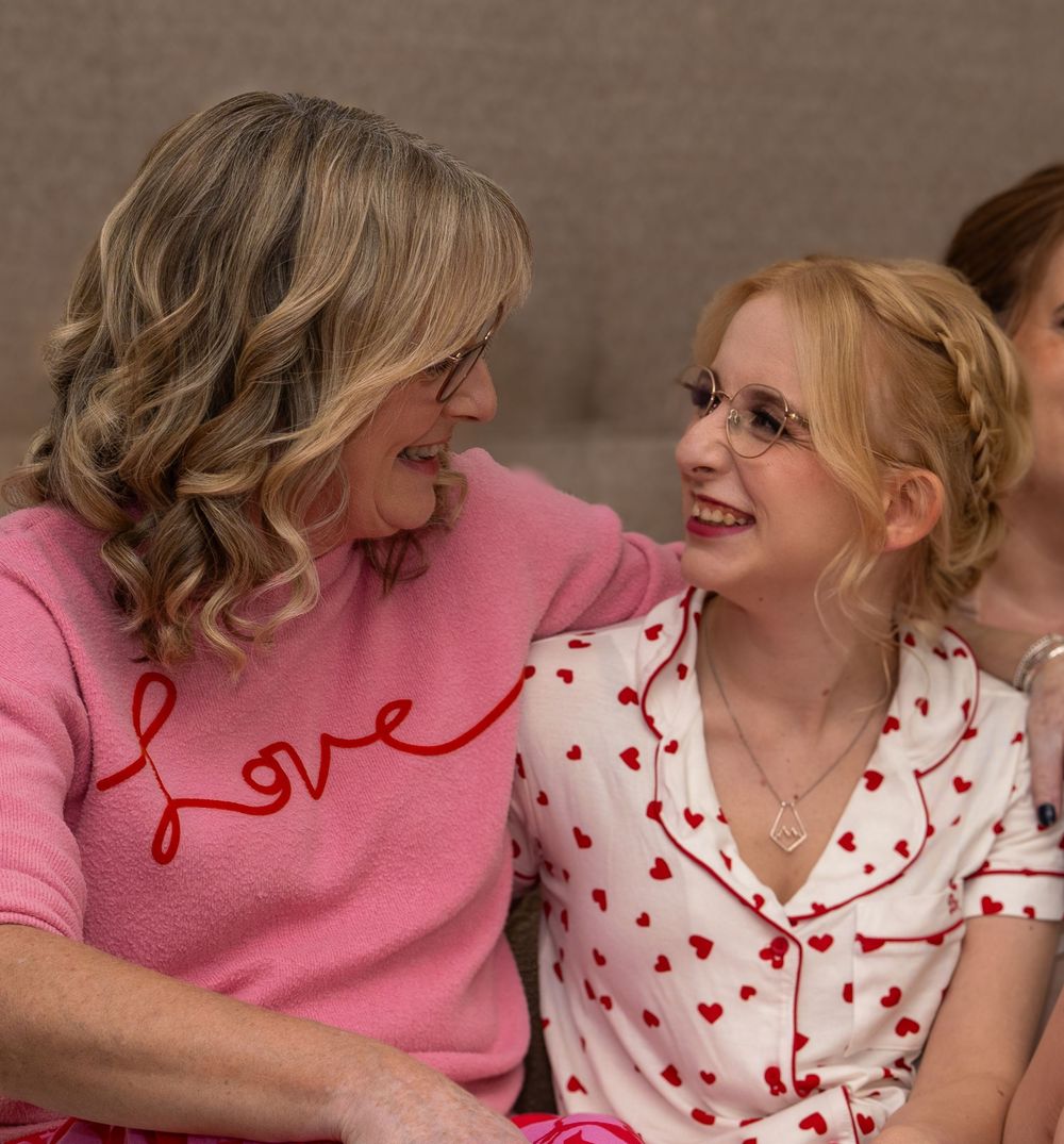 Candid moments shared in pink and heart-patterned loungewear.