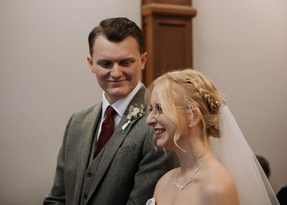 Sheffield Town Hall Wedding - Black and white wedding ceremony photos showing emotional exchanges.