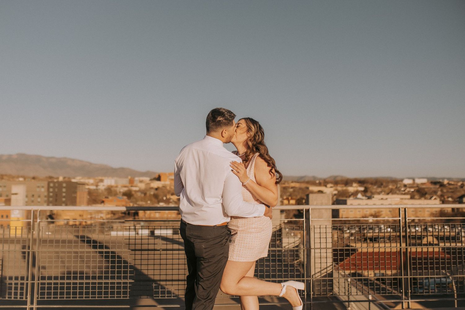 Albuquerque engagement photographer, engagement photos in albuquerque, rooftop engagement session, romantic and fun engagement session