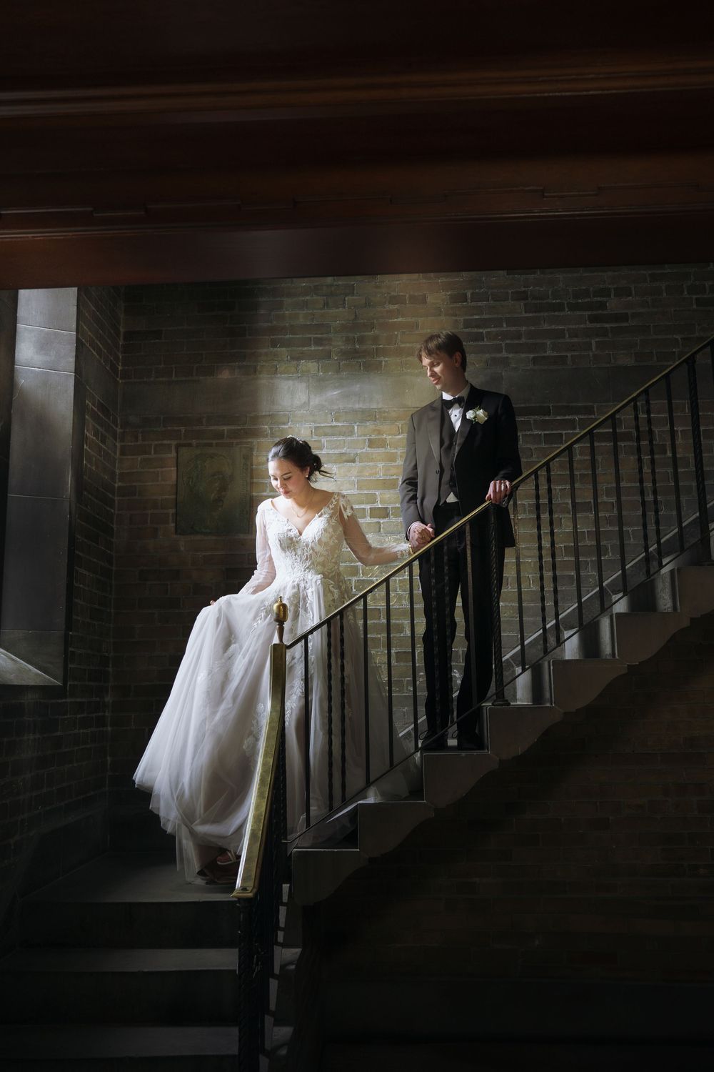 Elegant indoor wedding photography at Hart House in Toronto, capturing romantic moments.