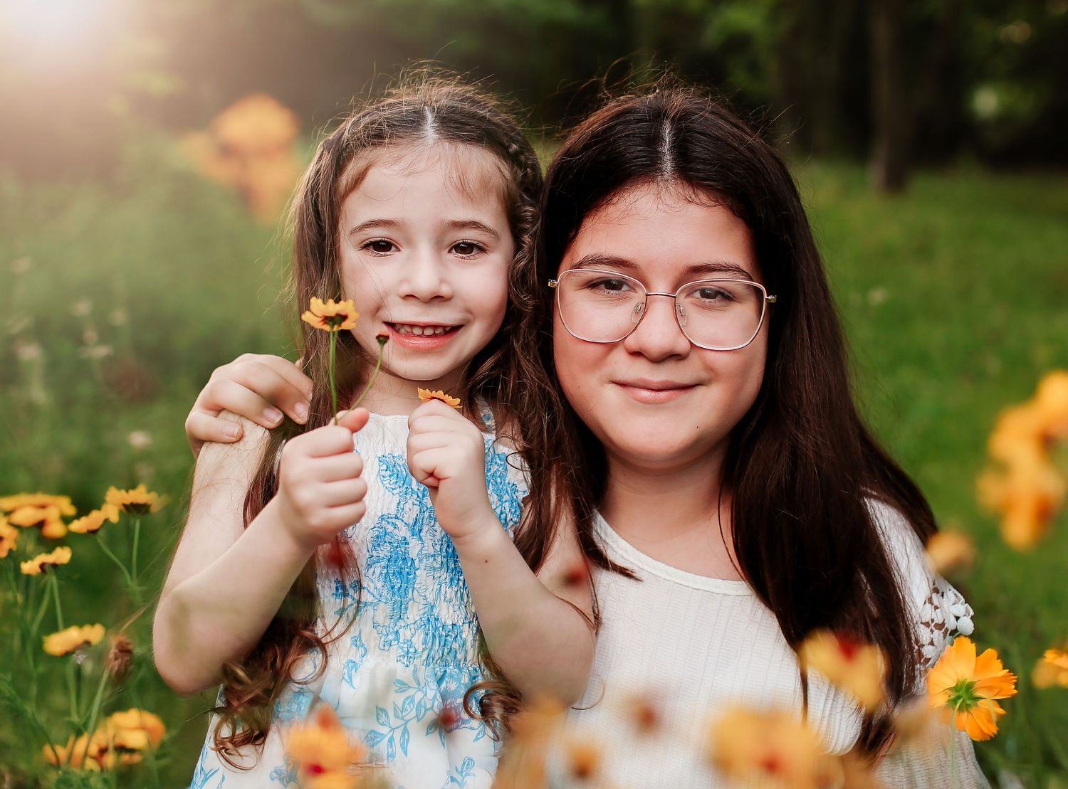 Siblings in open field for portraits