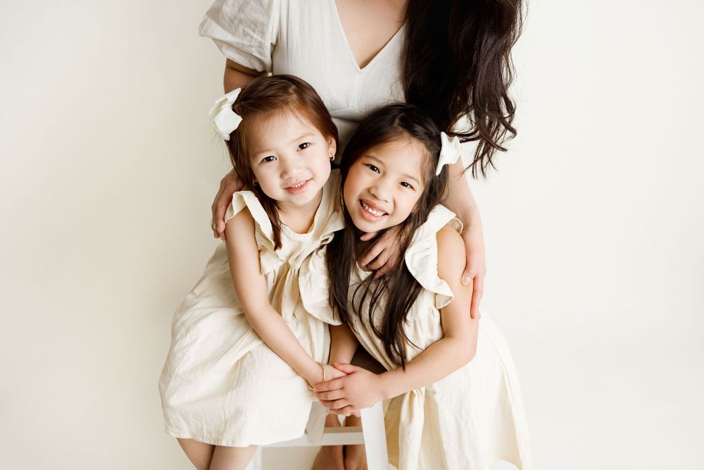 Mom and daughters family session pose