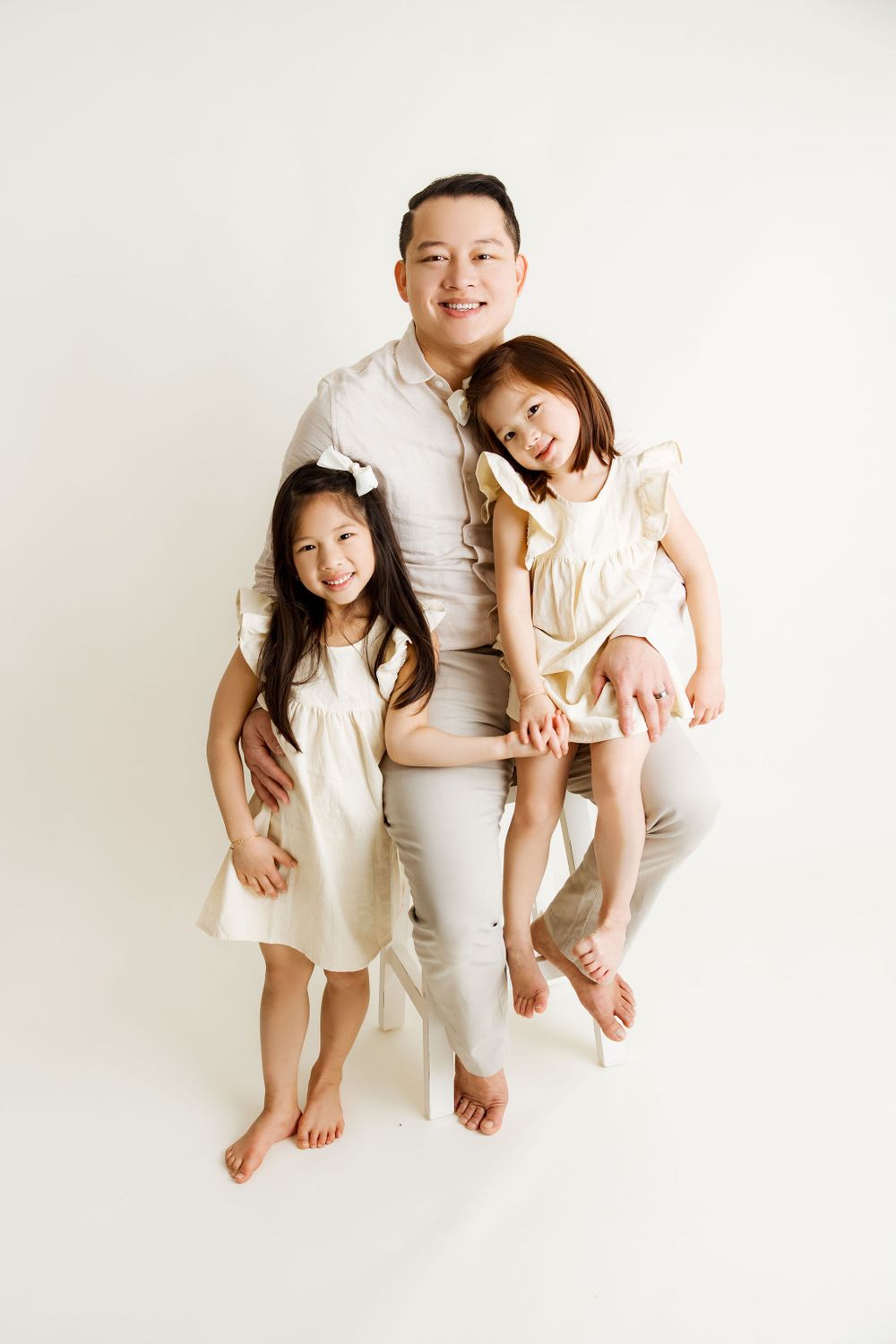 Dad with his two girls family portrait