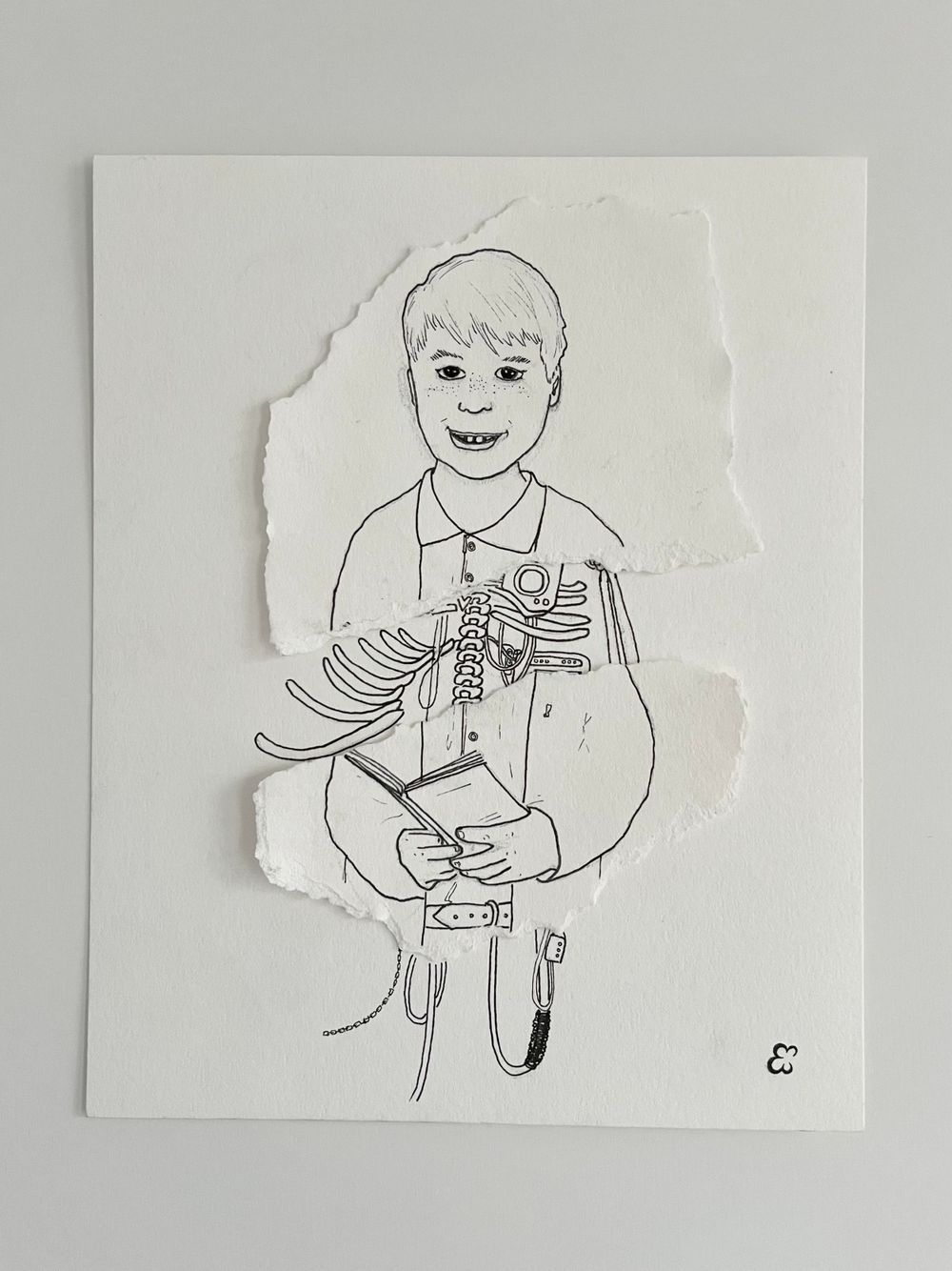 Sketch on torn paper showing a child holding a bible with mechanical parts and bones.