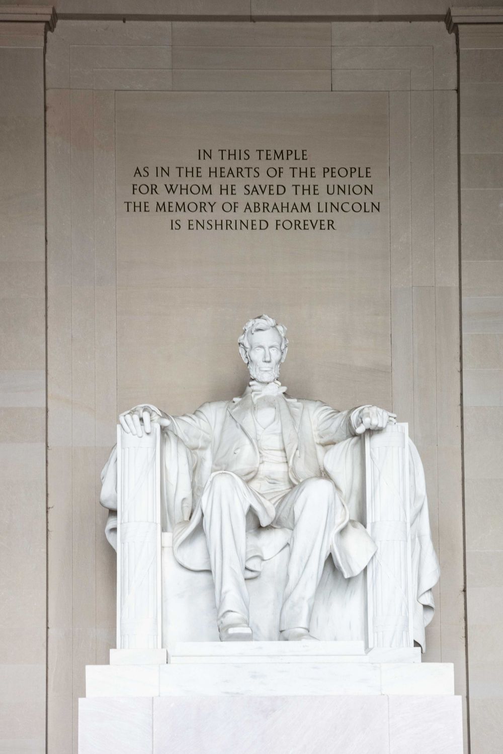 Lincoln Memorial statue with inscription text above in Washington DC.