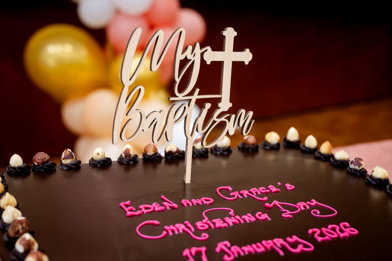 Chocolate baptism cake with 'My Baptism' topper for Eden and Giresa's Christening Day, January 17, 2023.