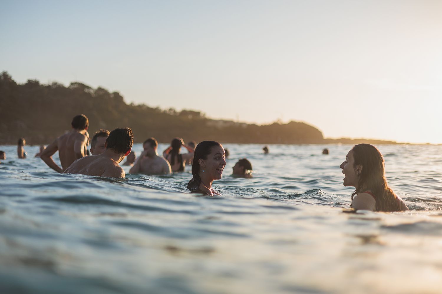 Freshie Sunrise Swims shot from water level with Aquatech housing — ocean lifestyle photography, Northern Beaches Sydney