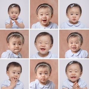 A collage of nine portraits of a smiling baby girl in a blue outfit and headband showing various cute expressions.
