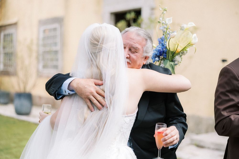 Bride and groom greeting family and friends after ceremony