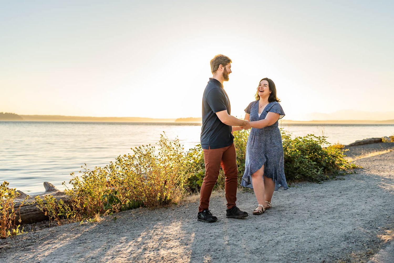 Husband and wife dance at Seattle beach.