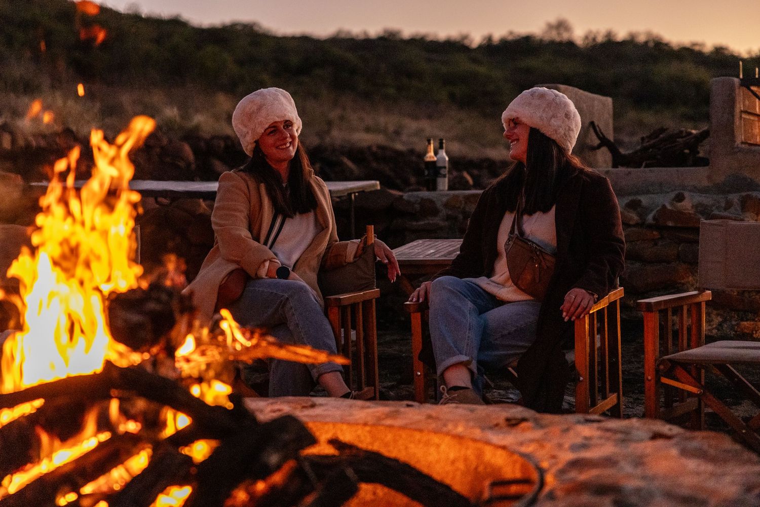 Experience South African safari at a Luxury Lodge, next to a warm fire, watching the African sunset.