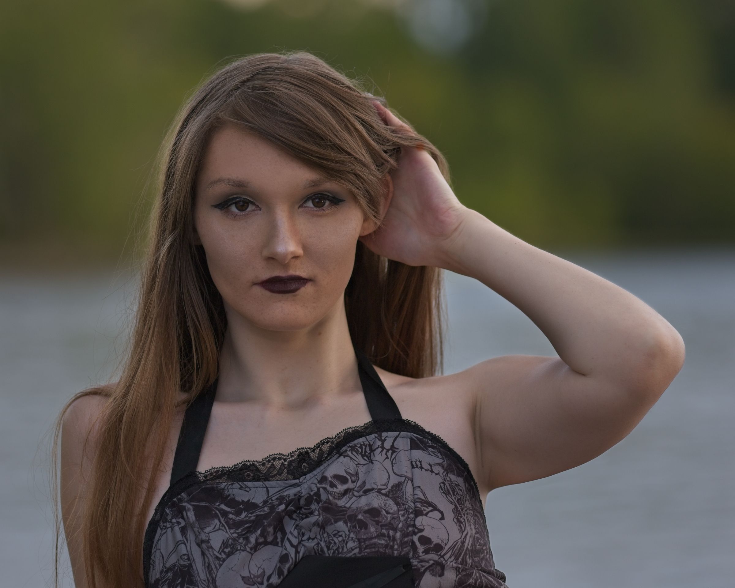 Portrait of a woman with a soft, focused expression, emphasizing her eyes.