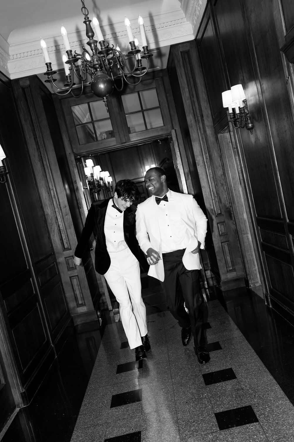 Black and white photo sequence showing a person in a white tuxedo jacket walking through an elegant hallway.