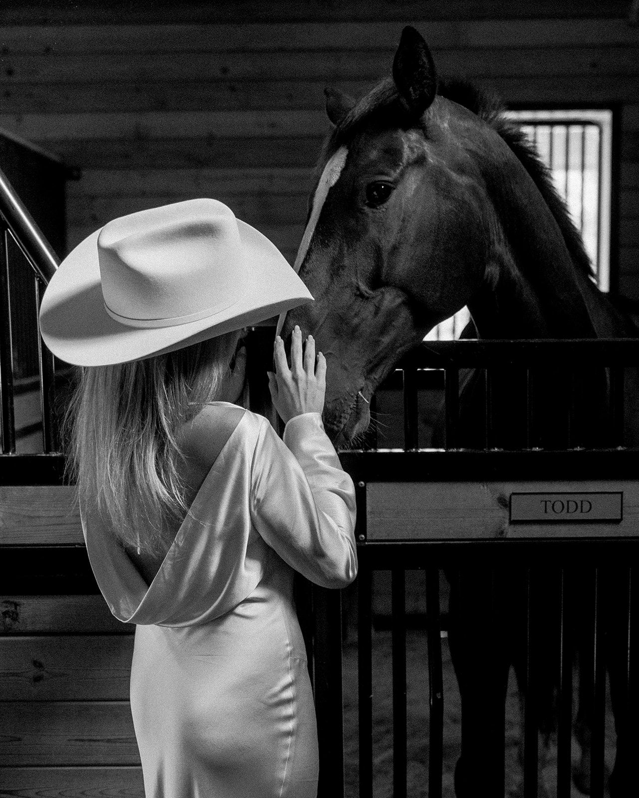 Bride and horse at western welcome party in Carmel Valley, CA