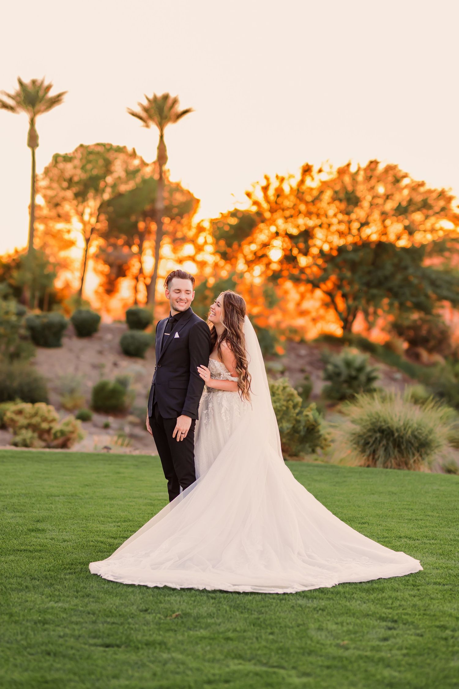 Romantic sunset wedding photo series showing tender moments between newlyweds in warm golden light.