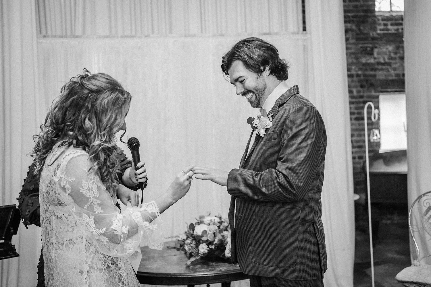 Black and white photo collage showing tender moments between a bride and groom during a wedding ceremony.