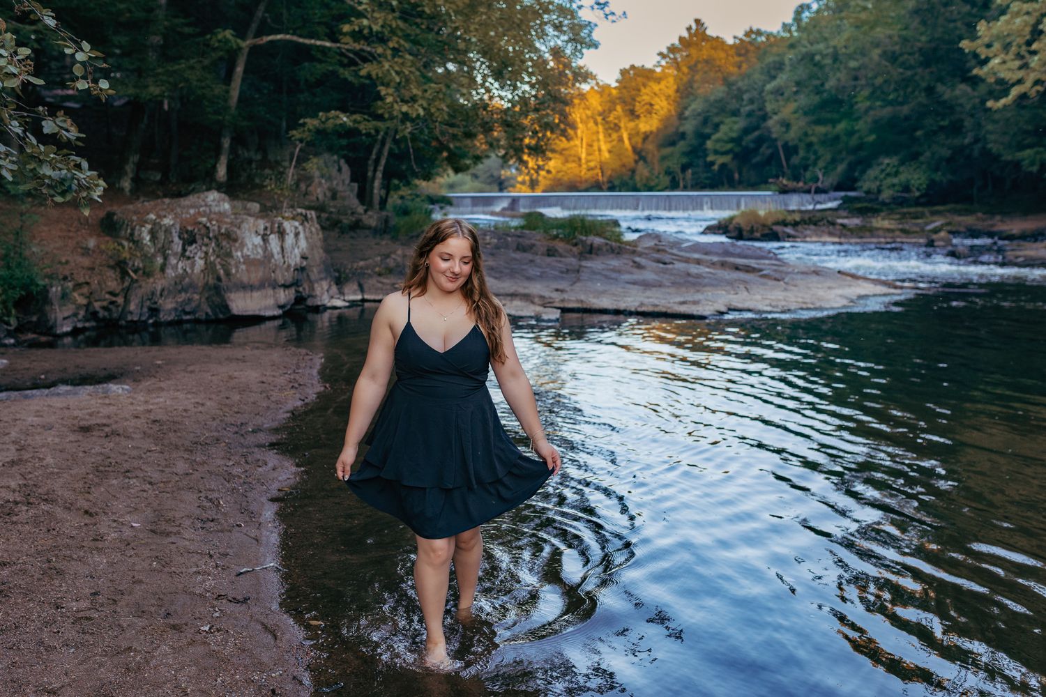 Senior walking on a beach during their outdoor Senior photography session