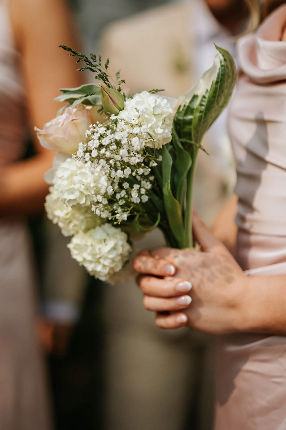 Bridesmaid bouquet in the sun