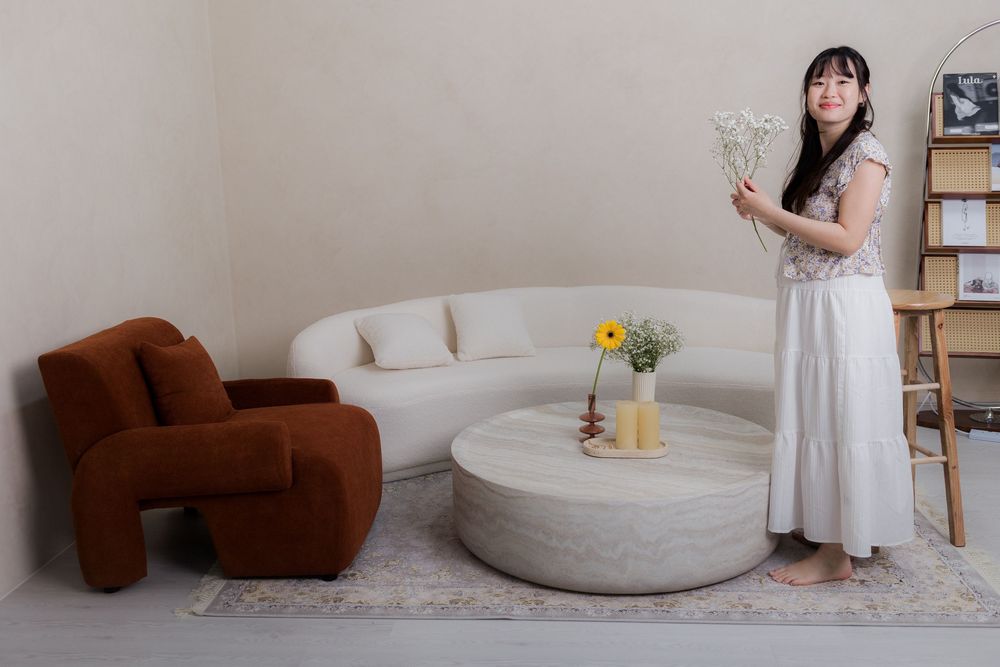 A series of minimalist interior design photos showing white furniture, bathtubs, and elegant home decor elements.