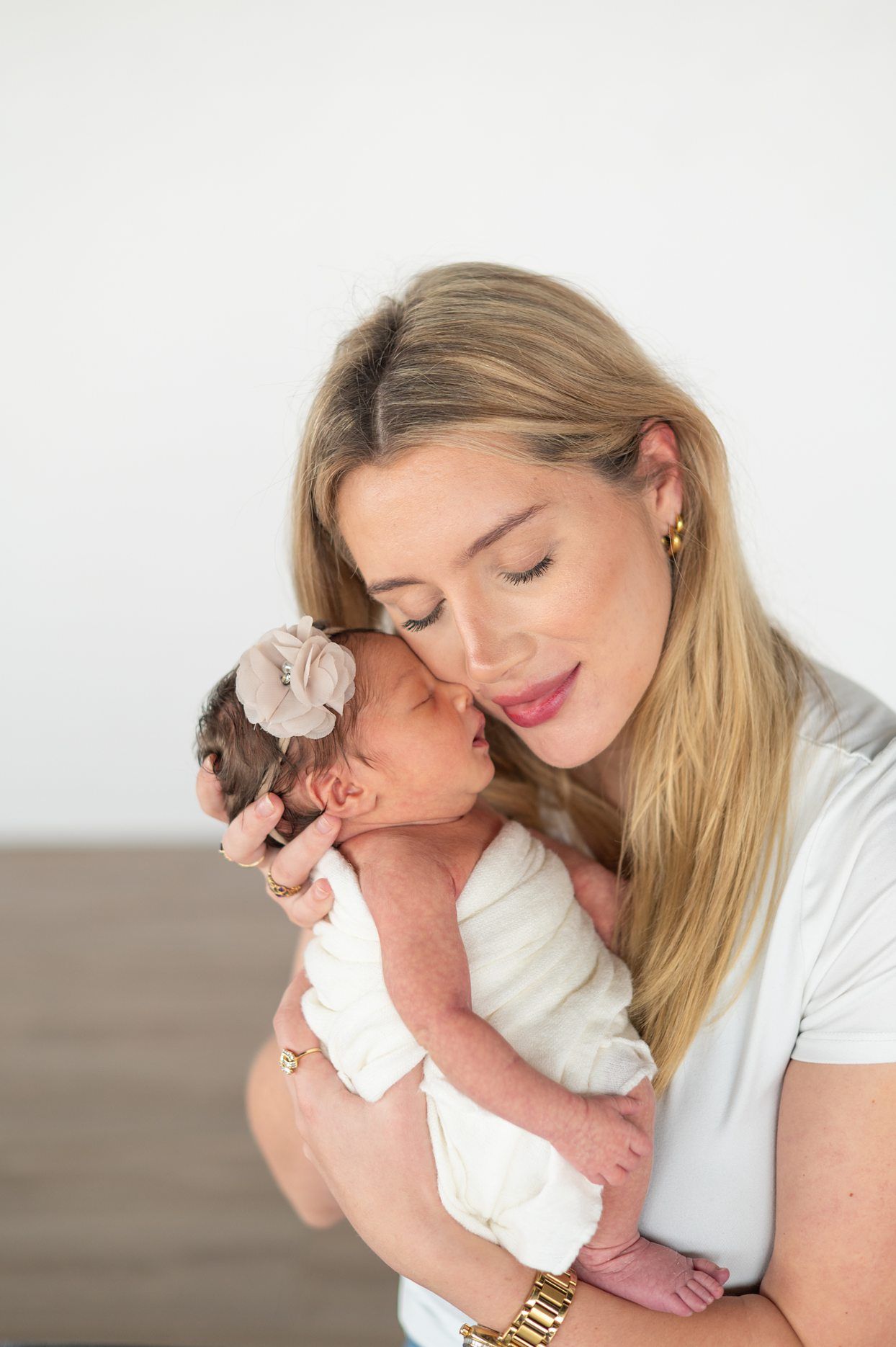 Newborn baby girl portrait session at Natural Light Studio with parents and grandparents by Bartlesville Newborn Photographer Kristi Bray