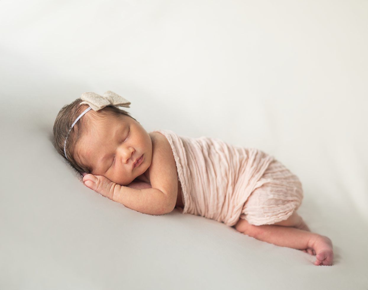 Newborn baby girl portrait session at Natural Light Studio with parents and grandparents by Bartlesville Newborn Photographer Kristi Bray