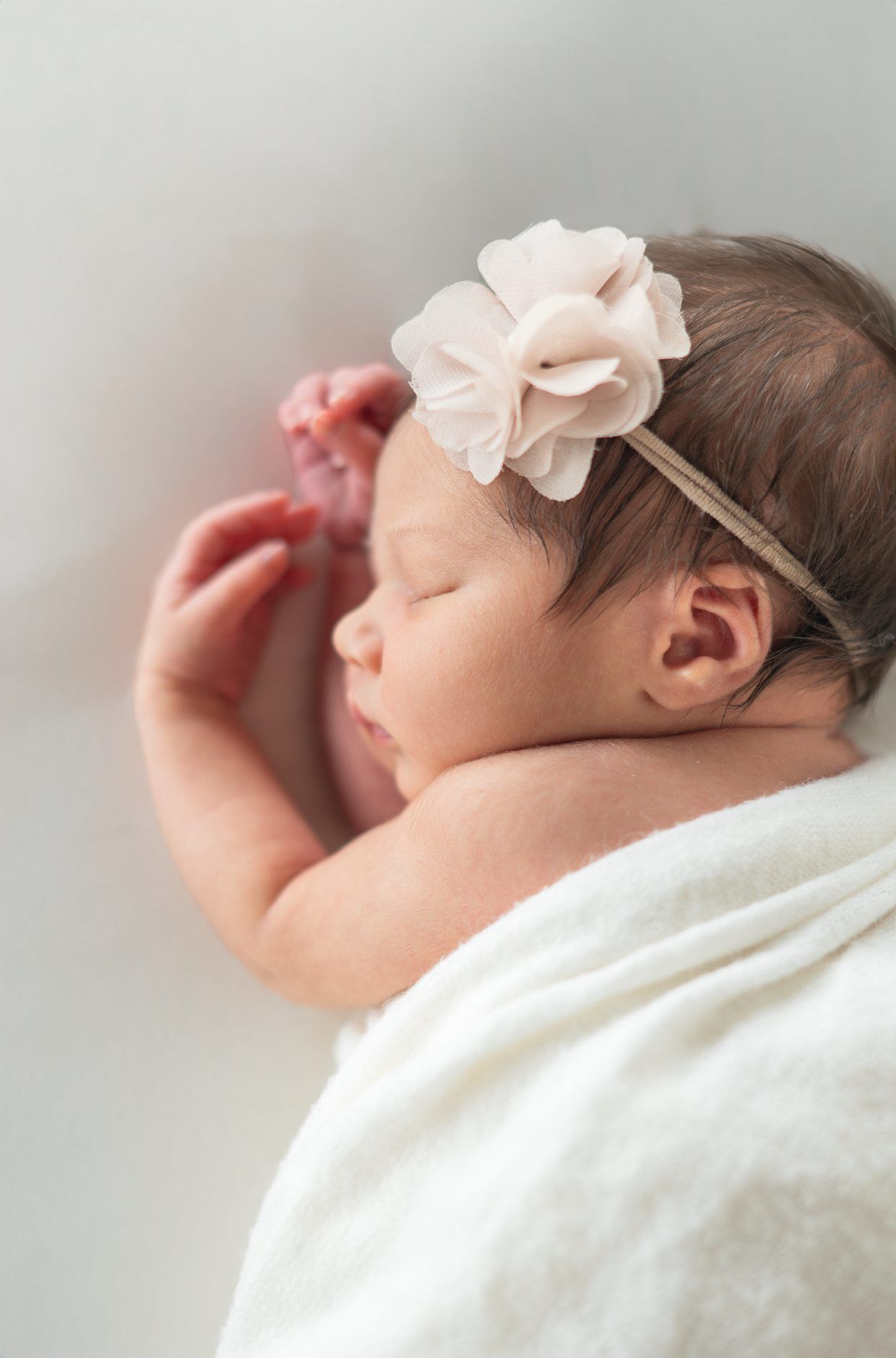 Newborn baby girl portrait session at Natural Light Studio with parents and grandparents by Bartlesville Newborn Photographer Kristi Bray