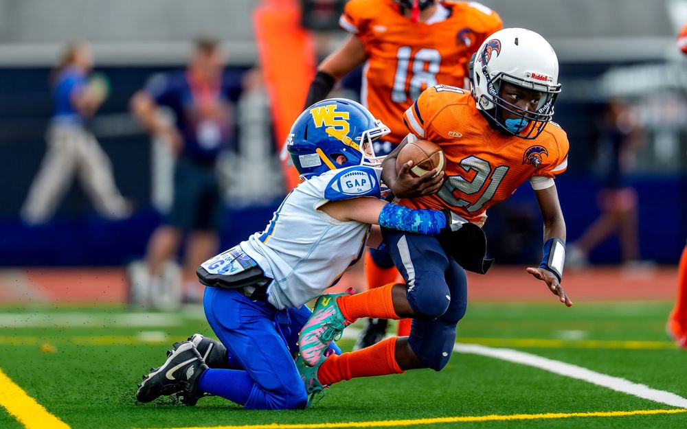 CFA Youth Football League team youth athlete running in Hershey PA, SportsFox Photography.